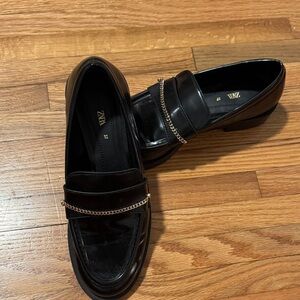 Zara Glossy Black Loafers with Gold Chain